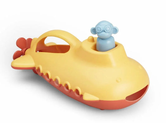 Gelbes und orangefarbenes U-Boot-Badespielzeug mit einer hellblauen Figur, die oben herausschaut.